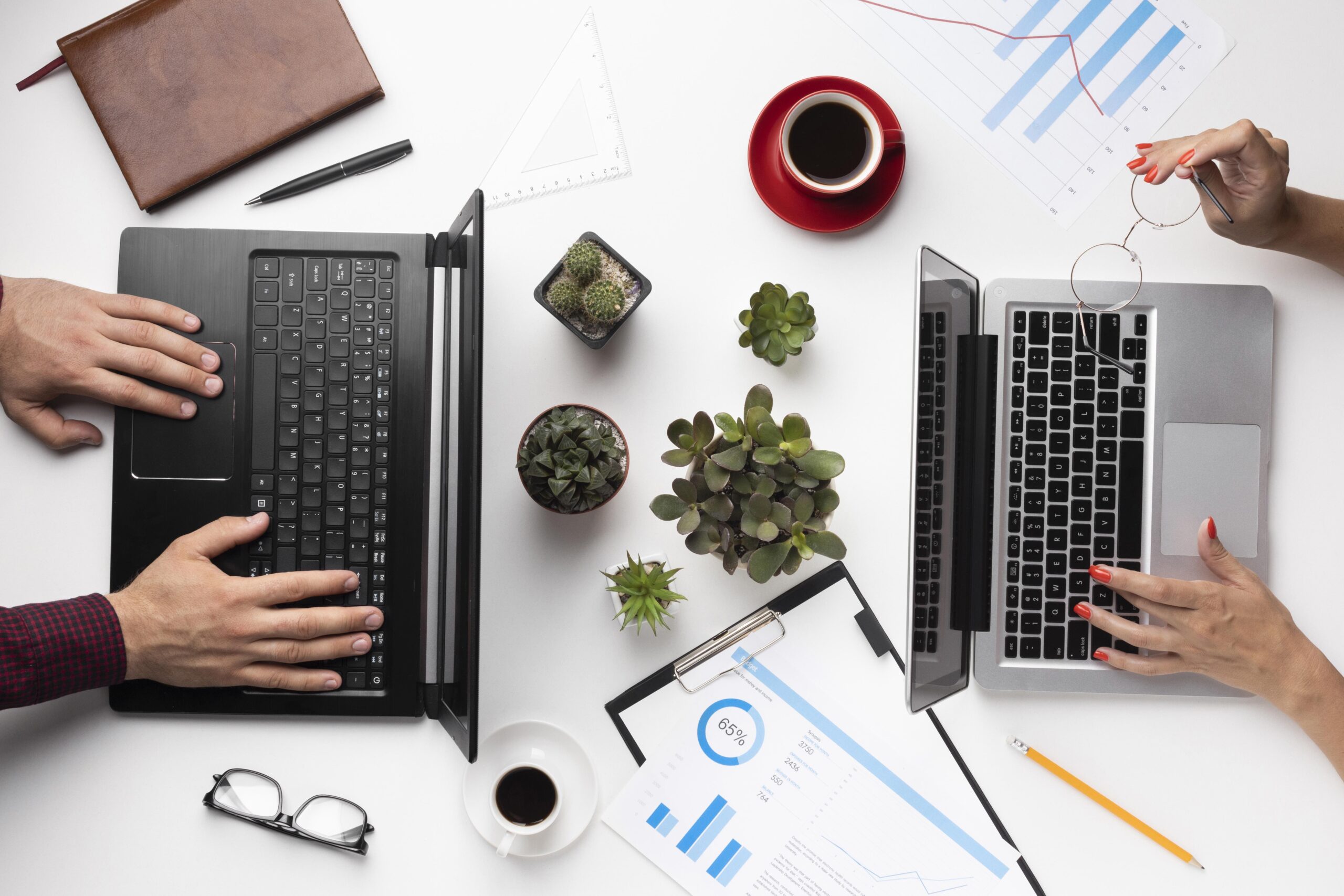 Domestic vs. Offshore VAs - top view of an office desk composition